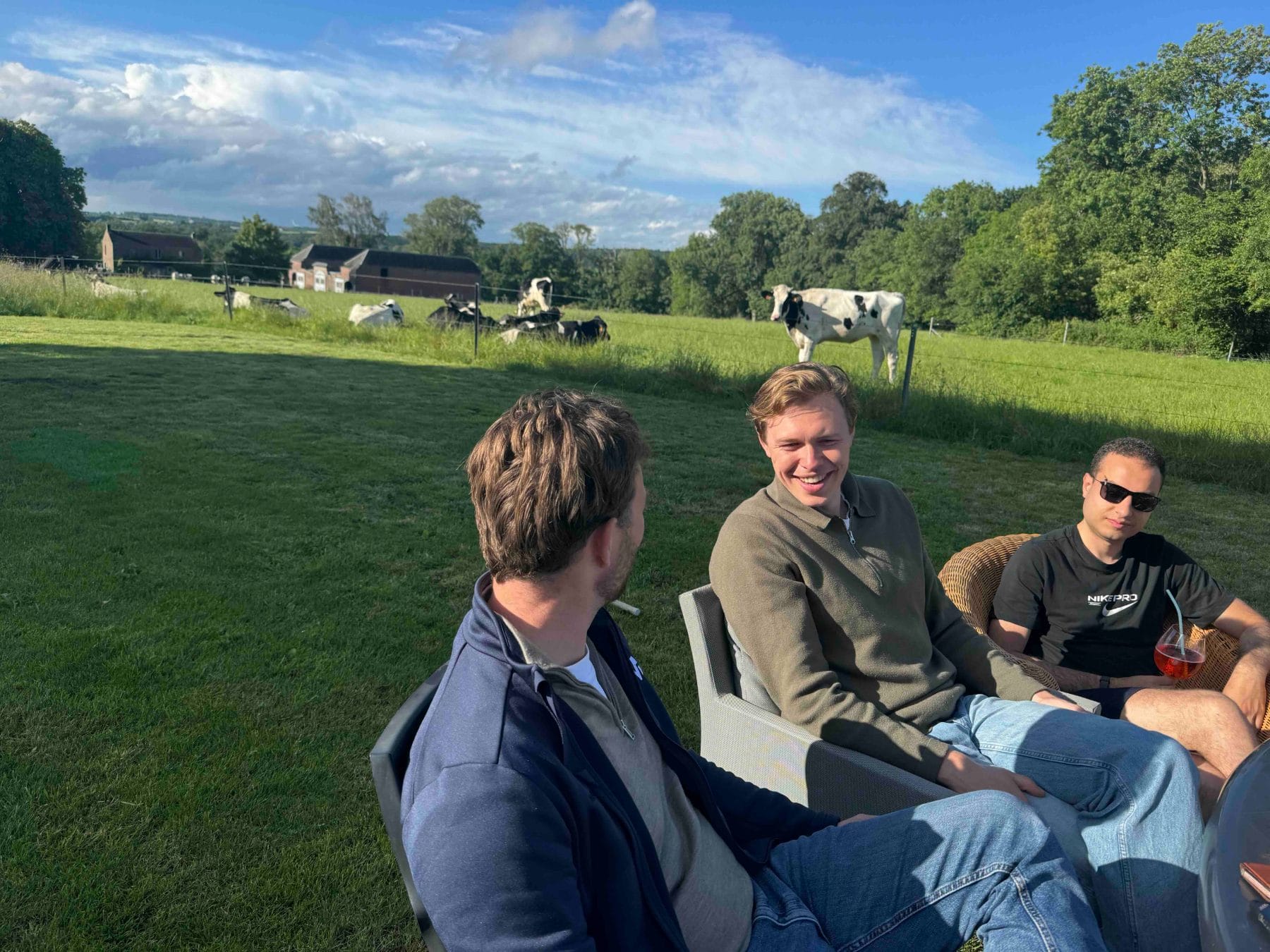Team in a field at golden hour